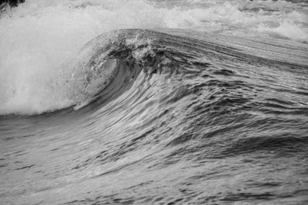 A black and white digital photograph of wave created by a machine